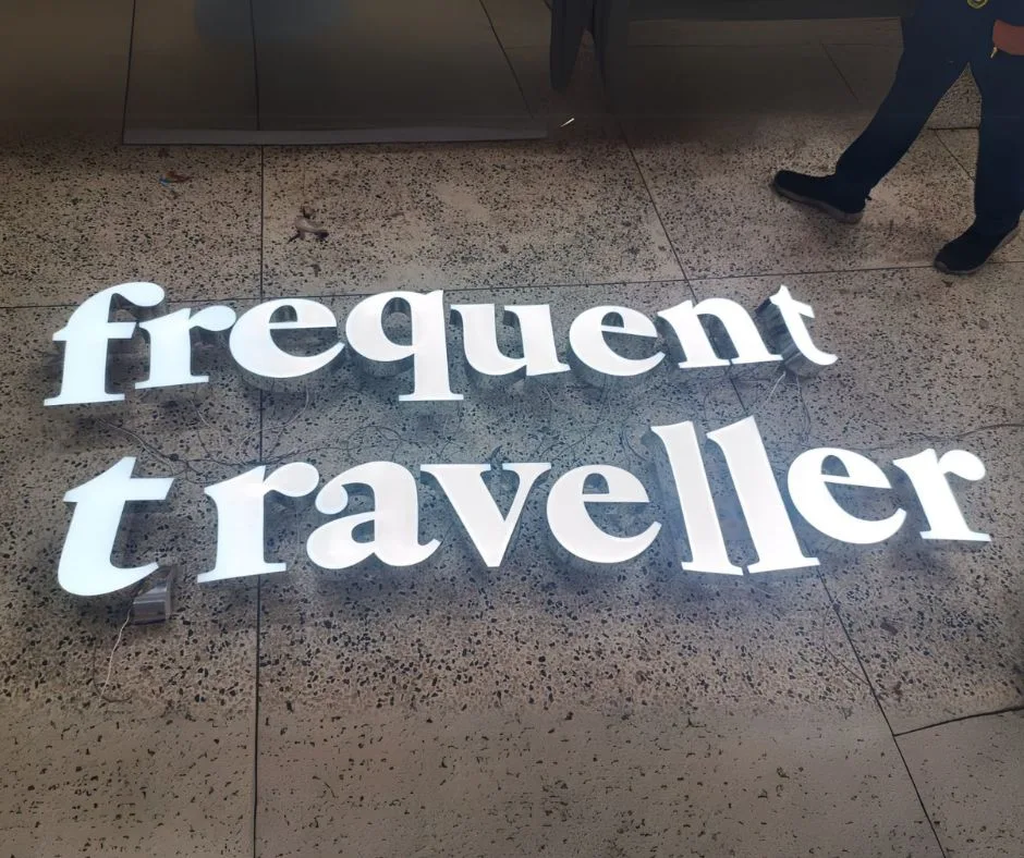 frequent traveller liquid letter sign board