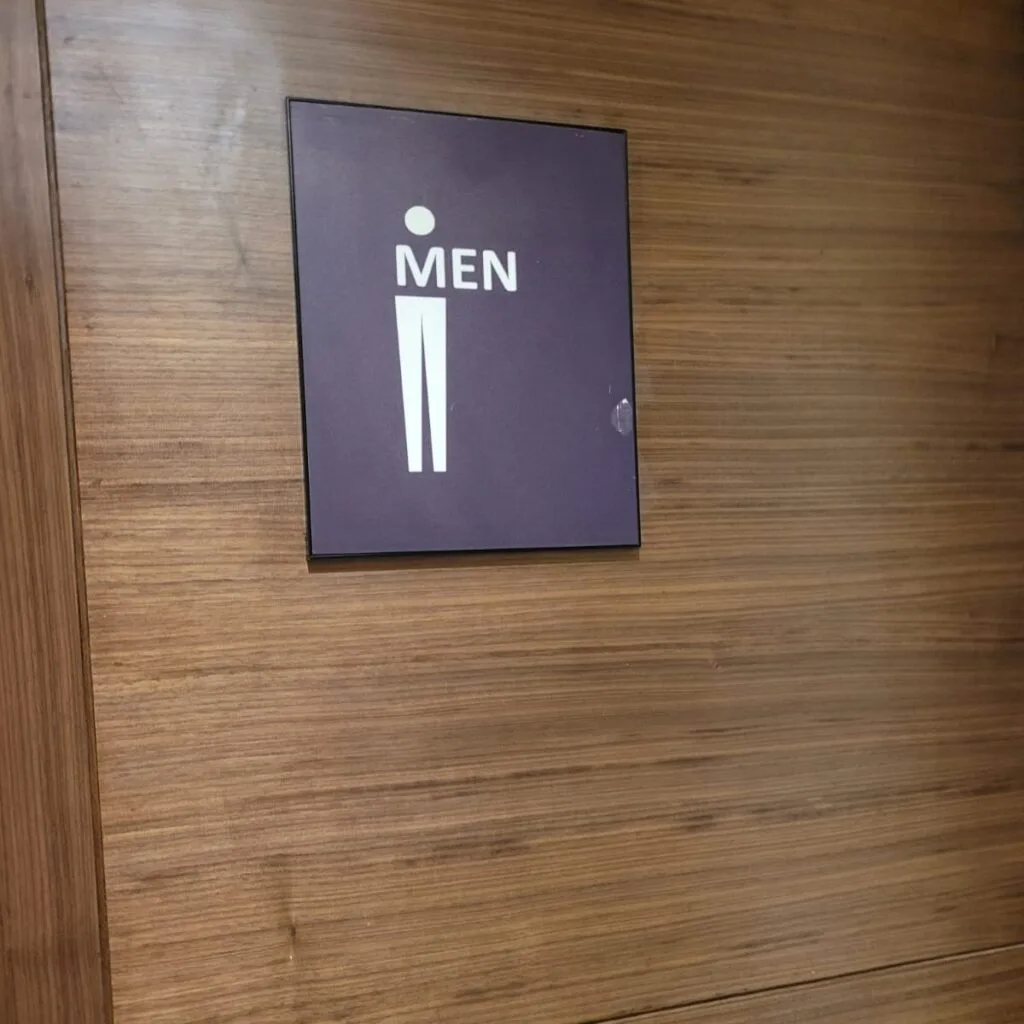 male restroom name plate sign